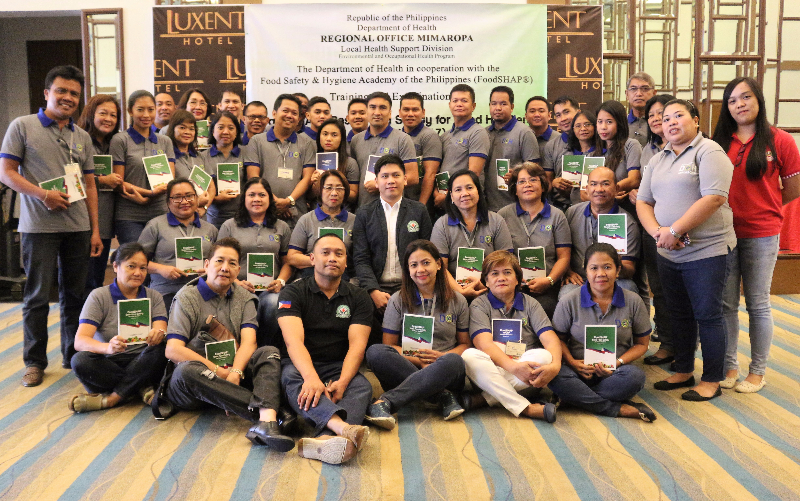 DOH-MIMAROPA and FoodSHAP Staff, together with the various Sanitary Inspectors of the region poses after taking a rigorous examination during the FIT program held on August 15-17, 2017 at Luxent Hotel in Timog, Quezon City.