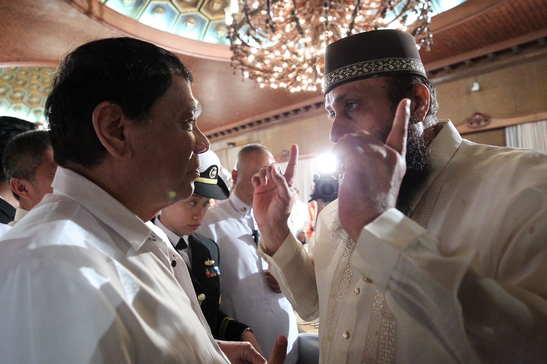 President Rodrigo Roa Duterte speaks to one of the attendees of the Eid'L Fitr Celebration at the Rizal Hall in Malacañan Palace on June 27, 2017. (Photo by Ace Morandante/Presidential Photo)