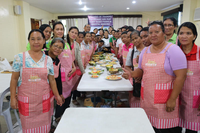 The 36 Barangay Nutrition Scholars of Oriental Mindoro with OLOF Raw Vegan and Plant Based Home Dining Chef Mae Dolonius (center) poses with their food products after the graduation ceremonies held at the Tree of Life Business Center in Calapan City, Oriental Mindoro on April 22, 2017.