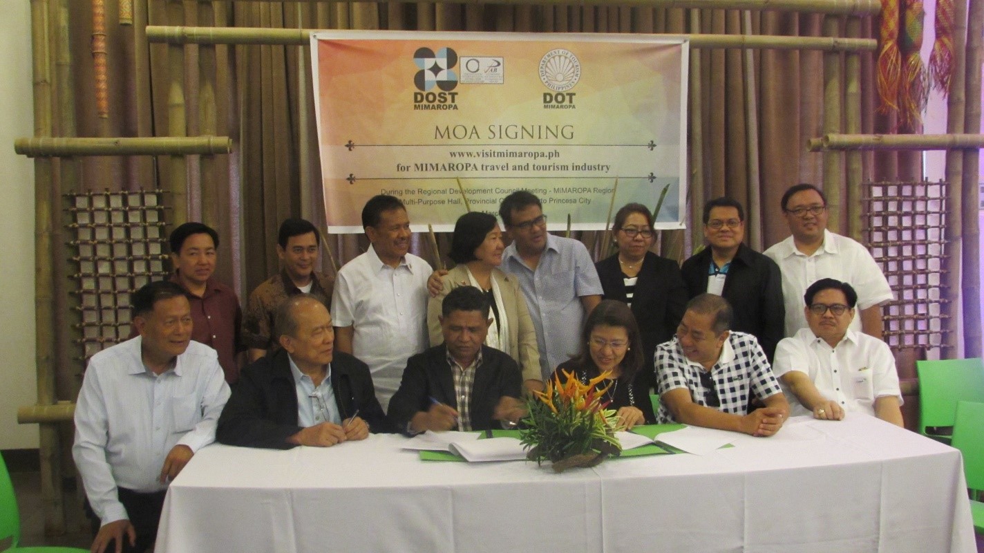 DOST-MIMAROPA Regional Director Dr. Ma. Josefina P. Abilay and DOT-MIMAROPA Regional Director Mr. Danilo B. Intong signs the Memorandum of Agreement for www.visitmimaropa.ph during the Regional Development Council Meeting. From Left to Right: Gov. Eduardo C. Firmalo (Romblon), Gov. Jose C. Alvarez (Palawan) and current RDC chair, Regional Director Mr. Danilo B. Intong (DOT-MIMAROPA), Regional Director Dr. Ma. Josefina P. Abilay (DOST-MIMAROPA), Gov. Alfonso V. Umali Jr. (Oriental Mindoro), and Gov. Mario Gene J. Mendiola (Occidental Mindoro)