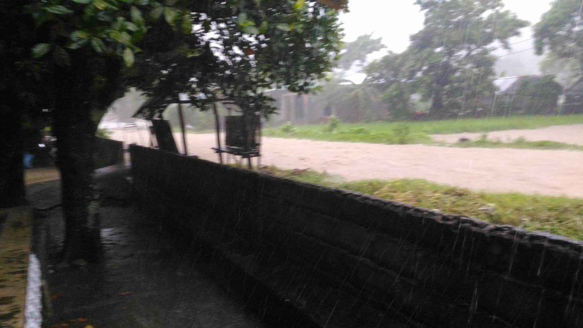 Flooded road of Barangay Taclobo, San Fernando town.